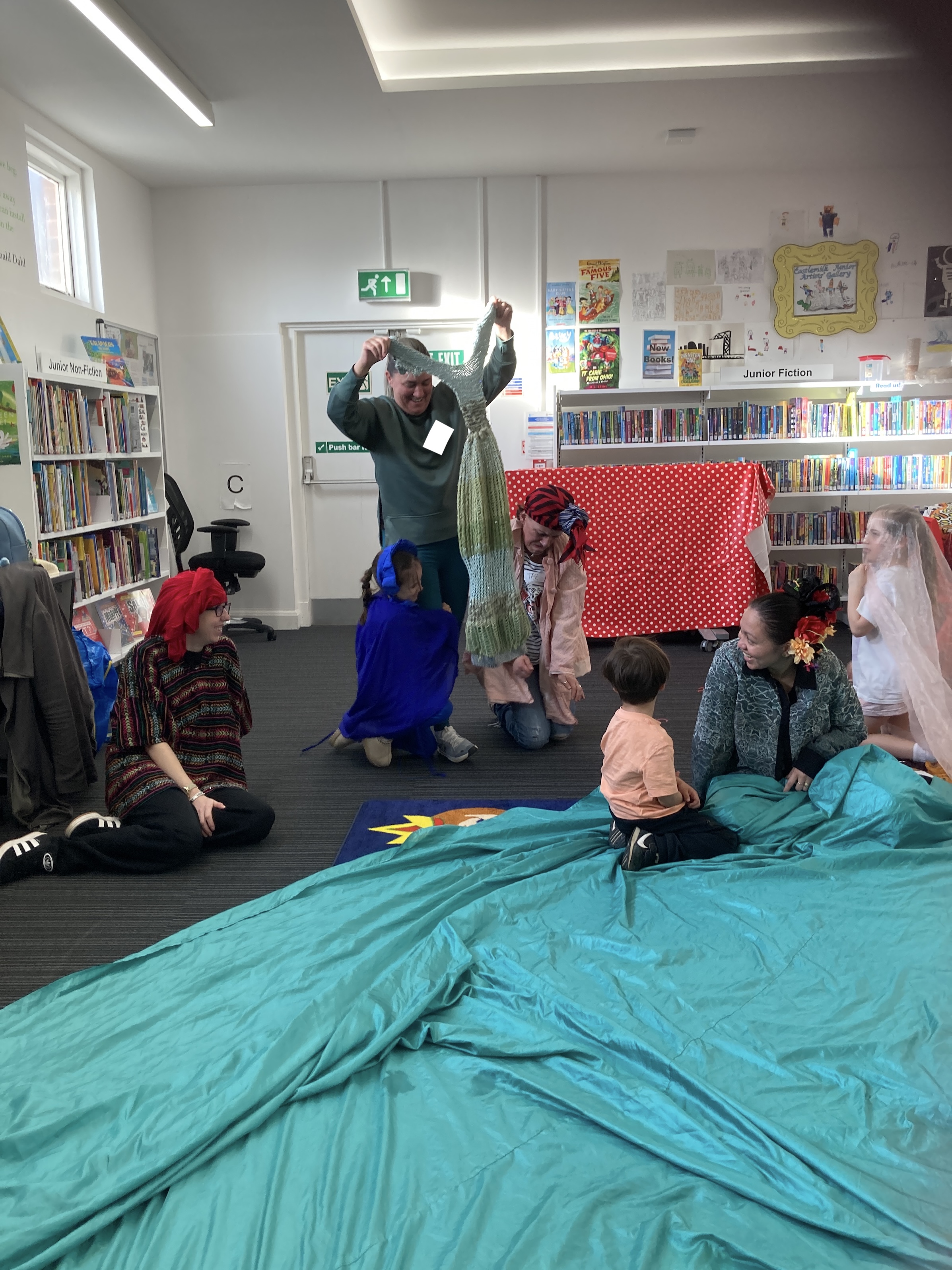 Itchy rhino scratches against the palm tree