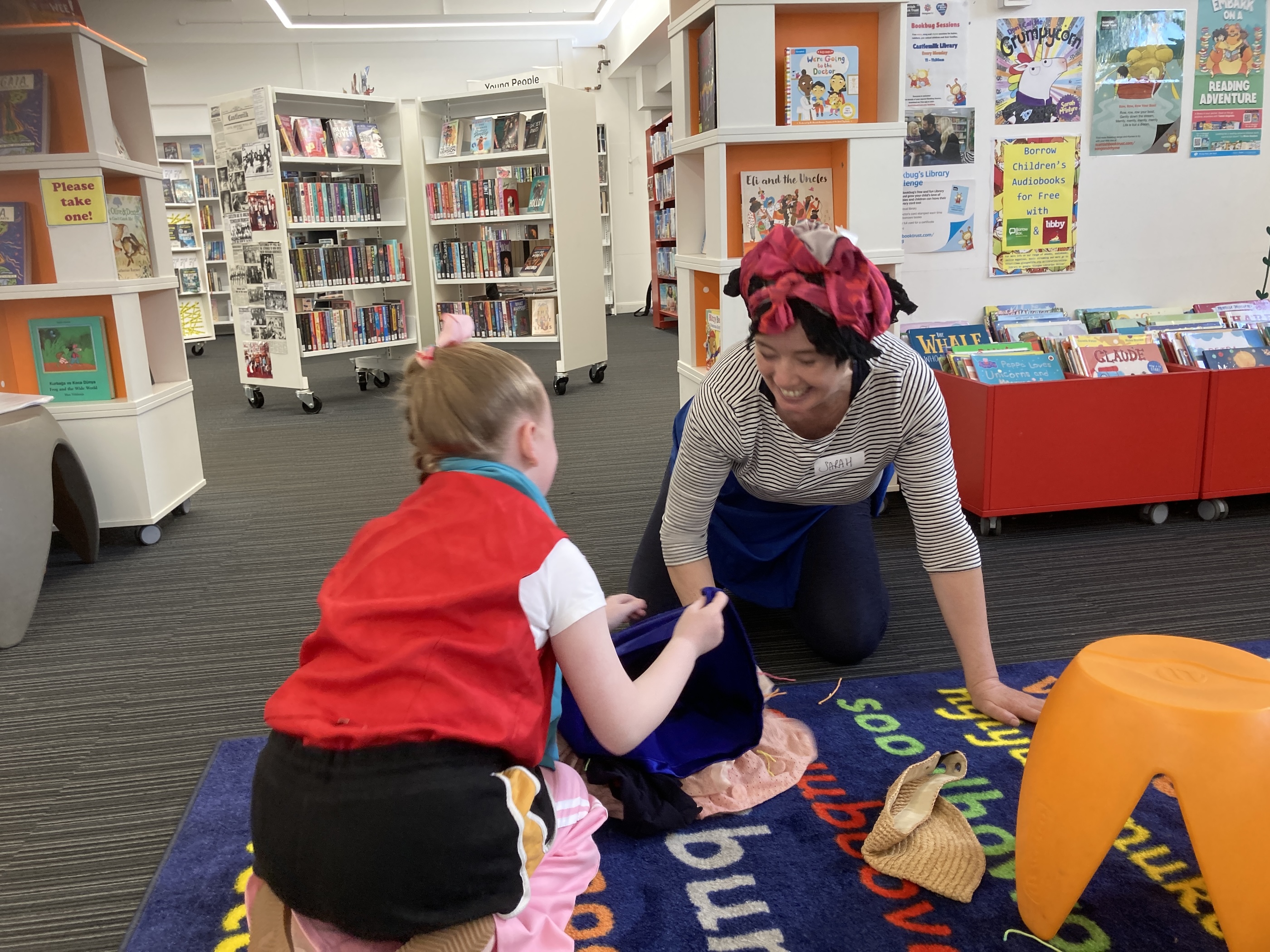 Mr. Parsee puts cake crums in the rhino’s skin